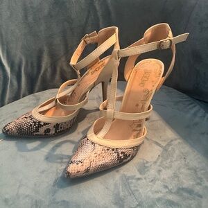Snake print pumps